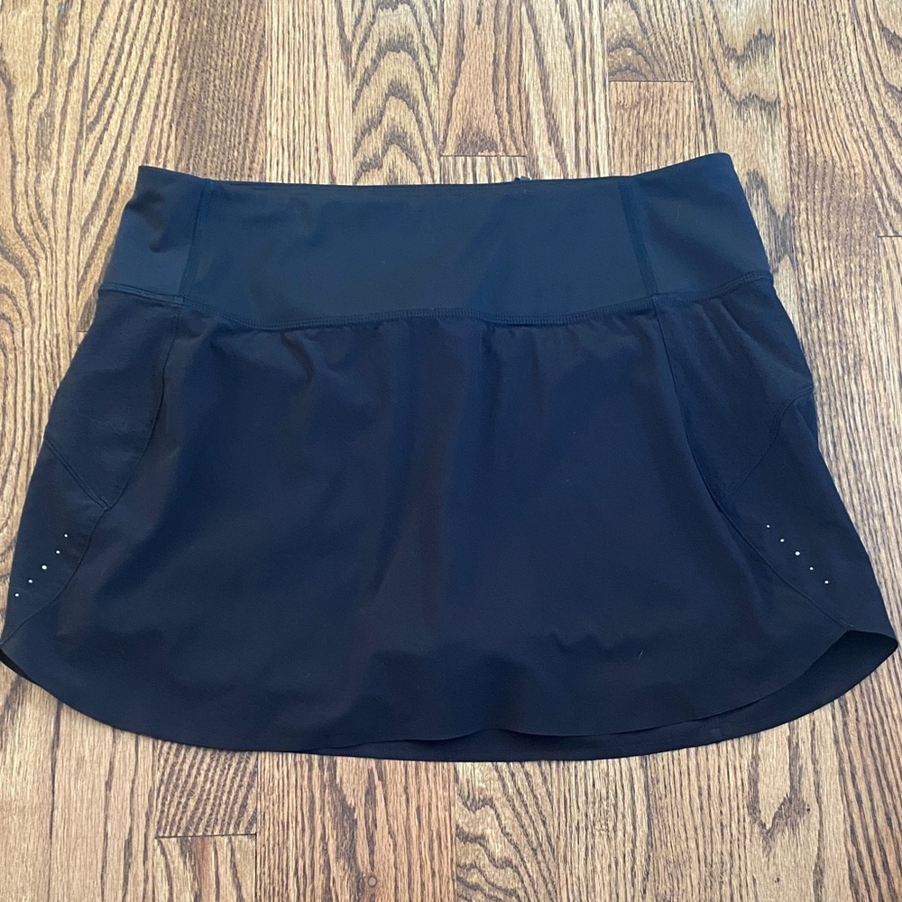Athleta black Run With It 14” skort, size M. Like new condition, ships quickly.